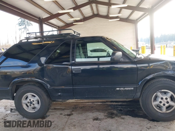 1999 Chevrolet Blazer LS with VIN 1GNCT18W3XK216840, listed as a IAAI auction lot 41534524 with 199,982 mi miles and . Bid and sale history available at DreamBid. Image 13.