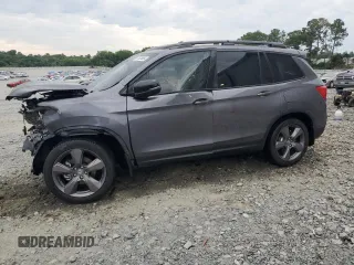 2021 Honda Passport Touring z VIN 5FNYF7H94MB005741, wystawiony jako Copart lot #57626664 z przebiegiem Nie podano mil oraz Szkoda całkowita • Salvage title. Historia ofert i sprzedaży dostępna na DreamBid. Obrazek 1.