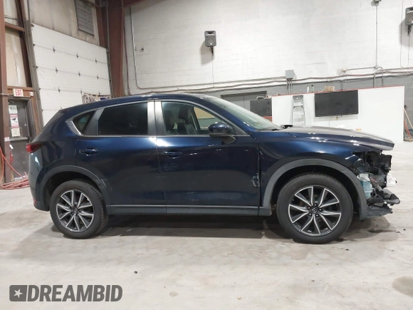 2018 Mazda CX-5 Touring with VIN JM3KFBCM5J0434716, listed as a IAAI auction lot 41738956 with 108,264 mi miles and . Bid and sale history available at DreamBid. Image 14.