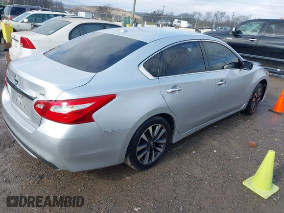2016 Nissan Altima SV with VIN 1N4AL3AP0GC262897, listed as a IAAI auction lot 41063385 with 157,331 mi miles and . Bid and sale history available at DreamBid. Image 4.