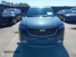 2021 Cadillac XT6 Premium Luxury with VIN 1GYKPERS0MZ110029, listed as a IAAI auction lot 41669104 with 58,890 mi miles and . Bid and sale history available at DreamBid. Image 12.