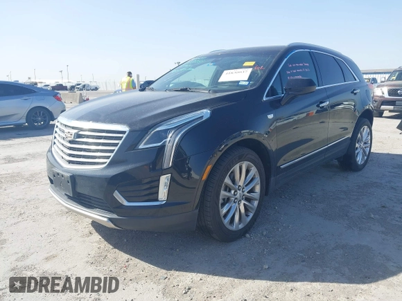 2017 Cadillac XT5 Platinum AWD z VIN 1GYKNFRS7HZ103127, wystawiony jako IAAI lot #41830037 z przebiegiem 82 480 mil mil oraz . Historia ofert i sprzedaży dostępna na DreamBid. Obrazek 18.
