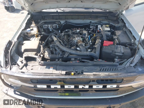 2022 Ford Bronco z VIN 1FMEE5DP3NLA80097, wystawiony jako IAAI lot #42461114 z przebiegiem 32 406 mil mil oraz . Historia ofert i sprzedaży dostępna na DreamBid. Obrazek 10.