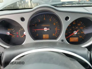 2004 Nissan 350Z Touring with VIN JN1AZ34E04T063110, listed as a Copart auction lot 50124855 with 142,383 mi miles and Salvage Title. Bid and sale history available at carsss.com. Image 9.