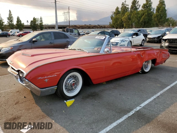 1961 Ford Thunderbird with VIN 1Y73Z116153, listed as a Copart auction lot 70746614 with 83,218 mi miles and Salvage Title. Bid and sale history available at DreamBid. Image 1.