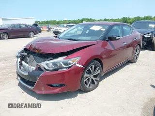 2017 Nissan Maxima SL with VIN 1N4AA6AP6HC448324, listed as a IAAI auction lot 42389918 with 117,704 mi miles and . Bid and sale history available at DreamBid. Image 2.