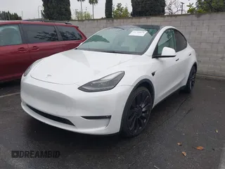 2021 Tesla Model Y Performance with VIN 5YJYGDEF2MF230374, listed as a IAAI auction lot 41708828 with 20,272 mi miles. Bid and sale history available at carsss.com. Image 6.