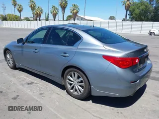 2014 Infiniti Q50 Premium with VIN JN1BV7AP0EM676949, listed as a IAAI auction lot 42684403 with 186,135 mi miles and . Bid and sale history available at DreamBid. Image 3.