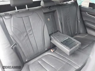 2016 BMW X5 xDrive35i with VIN 5UXKR0C57G0P24296, listed as a IAAI auction lot 41815189 with 116,084 mi miles. Bid and sale history available at carsss.com. Image 8.