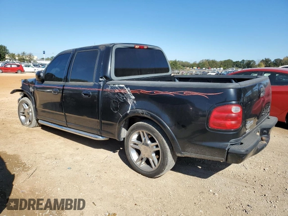 2002 Ford F-150 Harley Davidson with VIN 1FTRW07332KD46296, listed as a Copart auction lot 76333404 with 160,616 mi miles and Salvage Title. Bid and sale history available at carsss.com. Image 2.