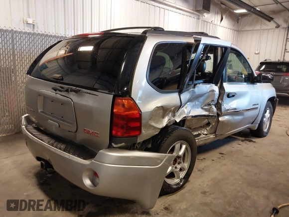 2006 GMC Envoy SLT with VIN 1GKDT13S262285832, listed as a IAAI auction lot 41794016 with 177,814 mi miles and . Bid and sale history available at DreamBid. Image 4.