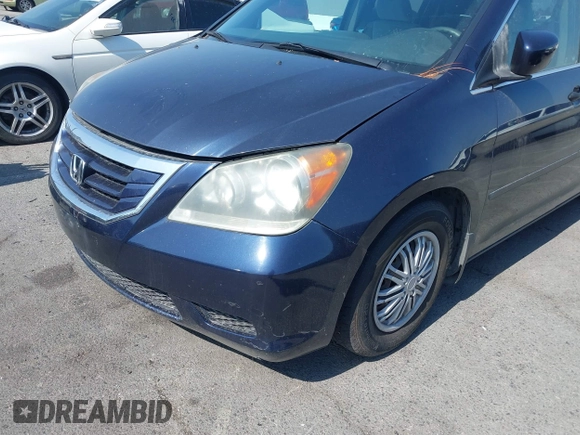 2008 Honda Odyssey LX with VIN 5FNRL38268B025424, listed as a IAAI auction lot 42432326 with 210,644 mi miles and . Bid and sale history available at DreamBid. Image 6.
