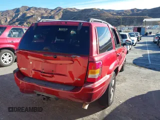 2002 Jeep Grand Cherokee Limited with VIN 1J8GX58N92C186560, listed as a IAAI auction lot 41383003 with 206,195 mi miles and . Bid and sale history available at DreamBid. Image 4.