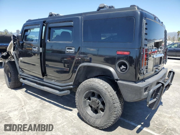 2003 Hummer H2 with VIN 5GRGN23U73H122529, listed as a Copart auction lot 50157934 with 0 mi miles and Salvage Title. Bid and sale history available at carsss.com. Image 2.