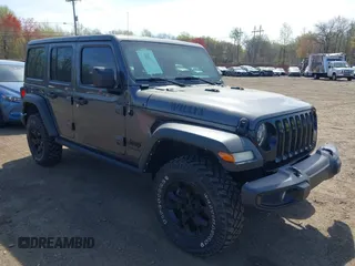 2021 Jeep Wrangler Unlimited Willys with VIN 1C4HJXDG1MW672507, listed as a IAAI auction lot 42084805 with 59,943 mi miles and . Bid and sale history available at DreamBid. Image 17.