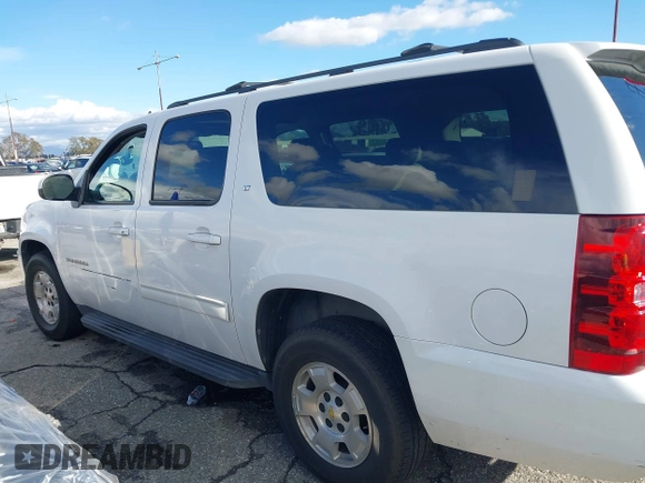 2010 Chevrolet Suburban LT with VIN 1GNUCJE05AR210539, listed as a IAAI auction lot 41805107 with 166,305 mi miles and . Bid and sale history available at DreamBid. Image 14.