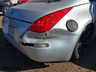 2006 Nissan 350Z with VIN JN1AZ34D56M306544, listed as a IAAI auction lot 42000765 with 150,126 mi miles. Bid and sale history available at carsss.com. Image 12.