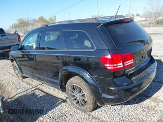 2018 Dodge Journey SE z VIN 3C4PDCAB9JT243816, wystawiony jako IAAI lot #41982817 z przebiegiem 173 092 mil mil oraz . Historia ofert i sprzedaży dostępna na DreamBid. Obrazek 3.
