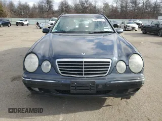 2001 Mercedes-Benz E-Class AWD with VIN WDBJH82J81X052002, listed as a Copart auction lot 82832724 with 187,464 mi miles and Salvage Title. Bid and sale history available at carsss.com. Image 5.