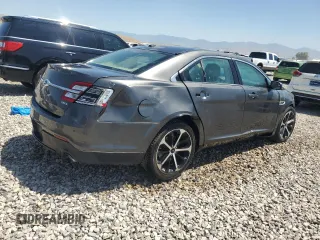 2015 Ford Taurus SEL с VIN 1FAHP2E87FG183122, выставлен на аукционе Copart как лот 62878955 с пробегом 94 374 миль миль и Списание • Salvage title. История ставок и продаж доступна на DreamBid. Изображение 3.
