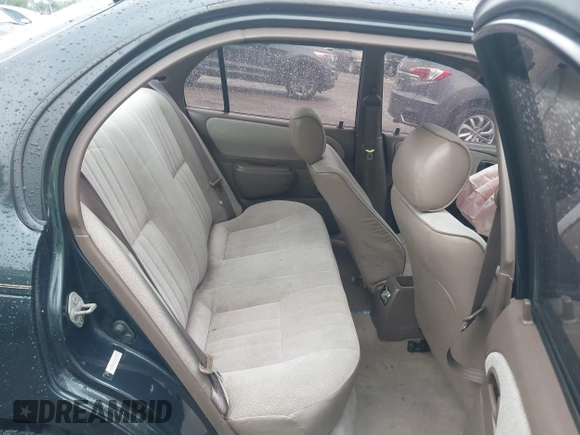 1997 Toyota Corolla with VIN 2T1BA02E2VC211034, listed as a IAAI auction lot 42253359 with 201,451 mi miles and . Bid and sale history available at DreamBid. Image 8.