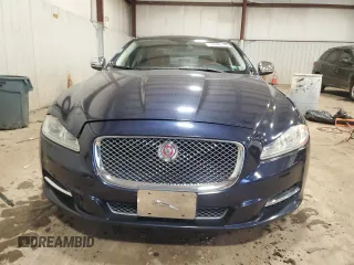 2014 Jaguar XJ Portfolio with VIN SAJWJ2GD7E8V67473, listed as a Copart auction lot 43968705 with 99,146 mi miles and Salvage title. Bid and sale history available at DreamBid. Image 5.