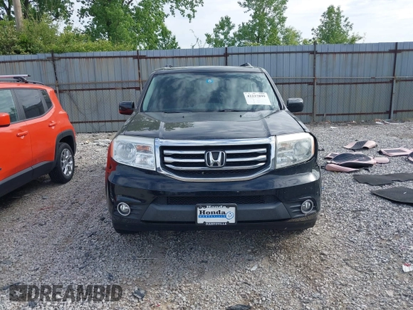 2013 Honda Pilot Touring with VIN 5FNYF3H93DB031630, listed as a IAAI auction lot 42237899 with 198,523 mi miles and . Bid and sale history available at DreamBid. Image 13.