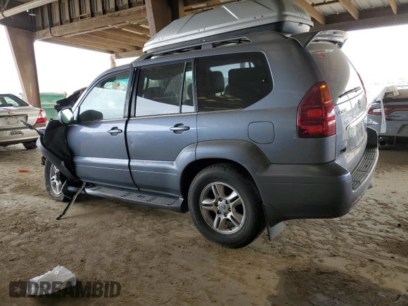 2005 Lexus GX 470 with VIN JTJBT20XX50073695, listed as a Copart auction lot 50595385 with 162,617 mi miles and Salvage Title. Bid and sale history available at carsss.com. Image 2.