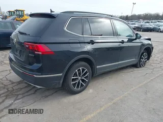 2021 Volkswagen Tiguan SE with VIN 3VV2B7AXXMM057849, listed as a IAAI auction lot 41879768 with 88,353 mi miles and . Bid and sale history available at DreamBid. Image 4.