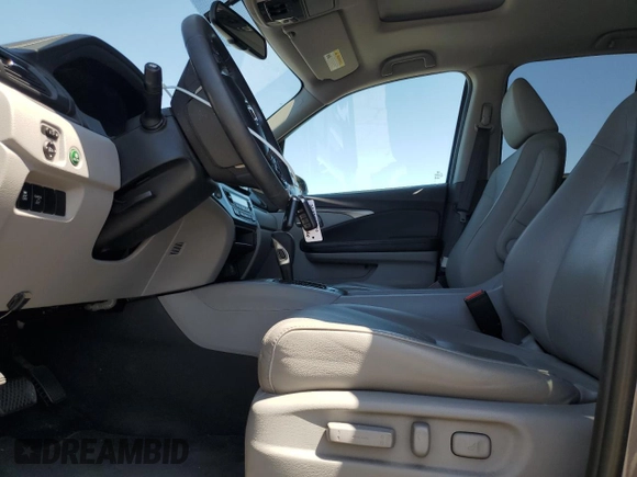2019 Honda Ridgeline RTL-T with VIN 5FPYK2F68KB003907, listed as a Copart auction lot 61276325 with 59,612 mi miles and Salvage title. Bid and sale history available at DreamBid. Image 7.