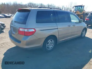 2006 Honda Odyssey EX-L z VIN 5FNRL38736B069969, wystawiony jako IAAI lot #41695311 z przebiegiem 196 218 mil mil oraz . Historia ofert i sprzedaży dostępna na DreamBid. Obrazek 4.