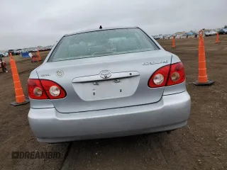 2006 Toyota Corolla CE with VIN 1NXBR32EX6Z594649, listed as a Copart auction lot 54328425 with 215,180 mi miles and Salvage Title. Bid and sale history available at DreamBid. Image 6.