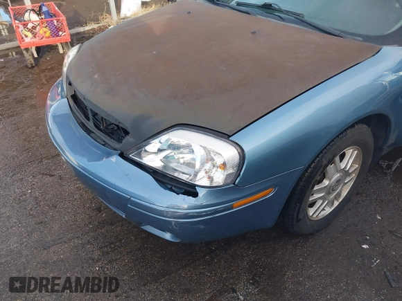 2005 Mercury Sable LS with VIN 1MEFM55S65A611575, listed as a IAAI auction lot 41535836 with 98,932 mi miles and . Bid and sale history available at carsss.com. Image 18.