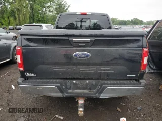 2018 Ford F-150 XL with VIN 1FTEX1EP8JFB61160, listed as a Copart auction lot 59914935 with 97,564 mi miles and Salvage title. Bid and sale history available at DreamBid. Image 6.