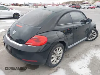 2013 Volkswagen Beetle Entry with VIN 3VWFP7AT8DM644840, listed as a IAAI auction lot 41387843 with 195,597 mi miles and . Bid and sale history available at DreamBid. Image 4.