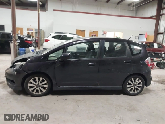 2013 Honda Fit Sport z VIN JHMGE8H56DC019556, wystawiony jako IAAI lot #41140755 z przebiegiem Nie podano mil oraz . Historia ofert i sprzedaży dostępna na DreamBid. Obrazek 13.