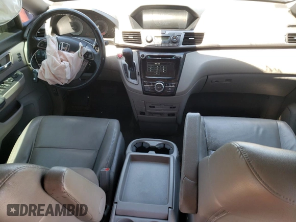 2014 Honda Odyssey Touring with VIN 5FNRL5H97EB016624, listed as a Copart auction lot 53444645 with 244,126 mi miles and Salvage Title. Bid and sale history available at DreamBid. Image 8.