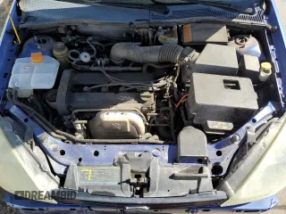 2004 Ford Focus ZX3 with VIN 3FAFP313X4R123879, listed as a Copart auction lot 54052055 with 174,692 mi miles and Salvage Title. Bid and sale history available at carsss.com. Image 11.