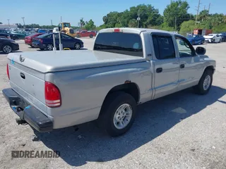 2000 Dodge Dakota Sport with VIN 1B7GL2AX6YS644891, listed as a IAAI auction lot 41961323 with 194,210 mi miles. Bid and sale history available at carsss.com. Image 4.