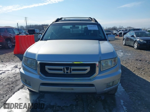 2009 Honda Ridgeline RTL with VIN 2HJYK16569H002832, listed as a IAAI auction lot 41683669 with 154,220 mi miles and . Bid and sale history available at DreamBid. Image 6.
