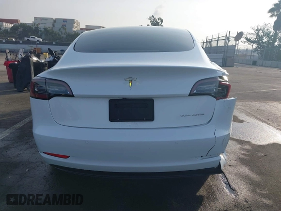 2021 Tesla Model 3 Long Range with VIN 5YJ3E1EB0MF009965, listed as a IAAI auction lot 41478233 with 31,713 mi miles and . Bid and sale history available at DreamBid. Image 16.