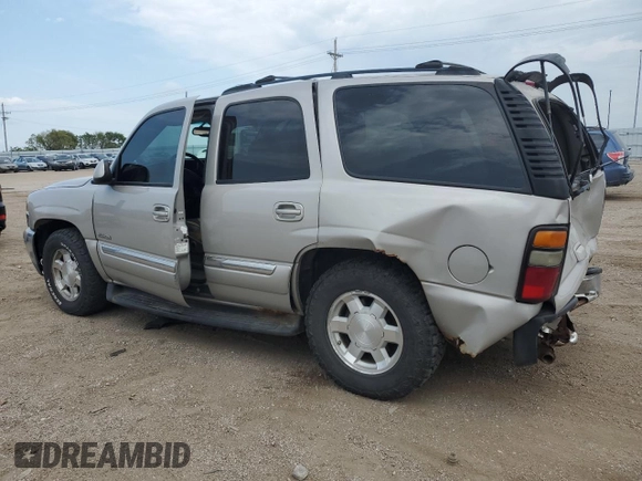2004 GMC Yukon SLT with VIN 1GKEK13Z74J295635, listed as a Copart auction lot 70412114 with 262,062 mi miles and Salvage Title. Bid and sale history available at carsss.com. Image 2.