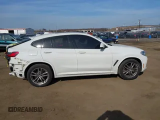 2021 BMW X4 xDrive30i z VIN 5UX2V1C01M9F26524, wystawiony jako IAAI lot #41805153 z przebiegiem 40 353 mil mil oraz . Historia ofert i sprzedaży dostępna na DreamBid. Obrazek 14.