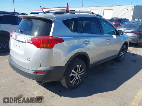2015 Toyota RAV4 LE with VIN JTMBFREV2FD127754, listed as a IAAI auction lot 41877447 with 111,678 mi miles and . Bid and sale history available at DreamBid. Image 4.