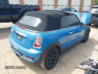2013 MINI Convertible S with VIN WMWZP3C53DT705016, listed as a IAAI auction lot 42155802 with Not provided miles and . Bid and sale history available at DreamBid. Image 4.