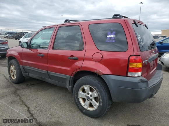2005 Ford Escape XLT with VIN 1FMYU93105KD73059, listed as a Copart auction lot 53149615 with 143,739 mi miles and Salvage Title. Bid and sale history available at carsss.com. Image 2.