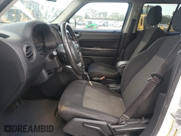 2016 Jeep Patriot Latitude with VIN 1C4NJPFA3GD612918, listed as a Copart auction lot 55830645 with 165,024 mi miles and Clean title. Bid and sale history available at DreamBid. Image 7.
