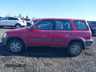 2000 Honda CR-V EX with VIN JHLRD1863YC051709, listed as a IAAI auction lot 41678500 with 197,313 mi miles. Bid and sale history available at carsss.com. Image 14.