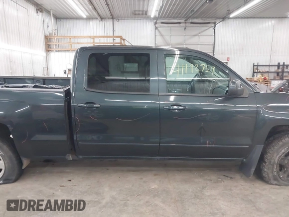 2017 Chevrolet Silverado 1500 LT with VIN 1GCUKREC0HF132896, listed as a IAAI auction lot 41192759 with 182,832 mi miles and . Bid and sale history available at DreamBid. Image 14.