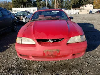 1995 Ford Mustang with VIN 1FALP4449SF205979, listed as a Copart auction lot 79690704 with 100,257 mi miles and Clean title. Bid and sale history available at DreamBid. Image 5.